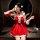 A woman poses elegantly in a festive christmas red velvet babydoll dress set, featuring intricate lace details and charming b...
