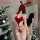 Sexy christmas-themed bodysuit featuring deep v-neckline, faux fur balls, and festive reindeer antlers headband. perfect holi...