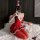 Sexy christmas-themed dress with deep v-neck and backless design, perfect for new year eve and holiday celebrations.