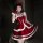 Sexy christmas dress with red bow, fluffy trimmings, and playful design perfect for holiday parties.