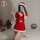A woman poses in a festive christmas-themed sleep dress, featuring a santa hat and bow tie, perfect for holiday role play out...