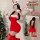 Sexy christmas outfit featuring a red bodycon mini dress, bunny ears, and festive accessories.