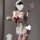 Cute butterfly backless maid costume featuring lace apron, tied waist, and cheeky cut-outs, perfect for playful elegance.
