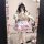 A woman wearing a cute maid costume, featuring a pink and white apron dress with ruffles, holding a fluffy cat. the outfit in...