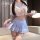 A stylish schoolgirl uniform set featuring a sweet crop top with ruffled details and a pleated mini skirt, perfect for anime-...