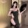 Sexy black lace high-slit nightgown with feather fan, perfect for date night and romantic occasions.