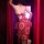 Woman wearing red dunhuang flying apsara lingerie set with gold-embossed sheer mesh bustier and skirt, back view.