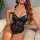 Elegant lace bodysuit featuring sheer mesh and blue floral embroidery, perfect for sensual sleepwear.