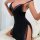 Woman wearing black elegant lace chemise nightgown with split slit, romantic lingerie set for women.