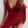 Woman wearing elegant red lace sheer sleepwear set, sexy bridal and date night lingerie outfit with flowing fabric.