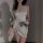 Elegant satin tie-back sleep dress with v-neckline and lace trim, perfect for a chic nightgown look.