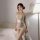 Sexy lace-up cheongsam mini dress with embroidered details, perfect maid outfit for women.