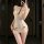 Woman modeling sheer lace bodysuit with deep v-neck and bow details, elegant sleepwear for intimate nights.