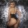 Sexy euro-style bodysuit with lace-up back detail, perfect for stage & club outfits, sparkling design for nighttime glamour.