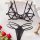 Black euro-style lace lingerie set with sheer bra and thong, styled on white fabric with red roses.