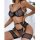 Woman wearing black lace mesh lingerie set with sheer bra, thong panty, and chain details.