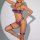 Woman modeling purple sheer mesh and lace lingerie set with garter straps, choker, and thigh bands.