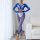 Woman modeling blue lace cut-out lingerie set with sheer fishnet pantyhose, featuring bold european-style design.