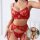 Woman modeling red european-style lace lingerie set with floral embroidery, sheer mesh cups, garter straps, and matching thon...