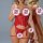 Woman modeling red european-style lace sheer lingerie set with corset top, garter belt, and matching panties.