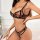 Woman modeling european style leopard print lingerie set with sheer bodysuit and strapless bra, showcasing bold design.