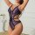 Woman wearing a purple european sexy lace lingerie set with sheer mesh and cut-out details, styled as seductive sleepwear.