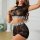 Woman modeling black lace lingerie set with love waistband, sheer mesh top and shorts, seductive european & us style sleepwea...