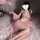 Exotic princess vintage-inspired lingerie set featuring a lace corset and flowing pink dress, perfect for belly dance perform...
