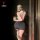 Woman in fei niao kui yue lace lingerie set, posing with phone—sexy open-crotch outfit for date night & role play.