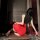 Woman in red and black fei niao kui yue sexy lingerie set, seductive secretary costume with pure-desire sleepwear design.