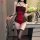 Woman modeling fei niao moon gaze lingerie set — sexy red lace bodysuit with adjustable straps, ties, and thigh-high stocking...
