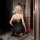 Woman wearing feiniao moon gaze lace bodysuit, a sexy mesh camisole sleepwear with bodycon wrap dress design, perfect for dat...