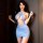Woman in light blue bodycon dress with chest-revealing cutout, posing indoors. flirty secretary lace sleep dress - sheer ol s...
