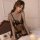 Woman wearing flower moon seduction lingerie set – sexy sheer black lace sleepwear with butterfly detail, no-remove design, o...