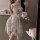 A woman wears a french-inspired lace sleep dress featuring vintage floral patterns, perfect for a sexy and flirty look.