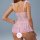 Woman wearing a pink french-style sheer lace sleep dress with floral embroidery, featuring a bust-enhancing design and sensua...