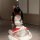 Sexy christmas outfit featuring a naughty maid costume with a butt-cutout and strapless design, perfect for festive celebrati...
