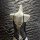 Glowing cloud sexy open-crotch leather bodysuit featuring cross-tie lace design and bell charm, perfect for women seeking ele...