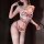 Woman wearing golden night lace embroidery lingerie set with floral push-up bra, thong, and lace thigh-high stockings.