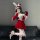 Sexy christmas bunny girl costume featuring red dress, bunny ears, and glittery heels, perfect for festive occasions.