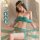 Vintage-inspired belly dance costume featuring green silk fabric, gold accents, and flowing designs perfect for cosplay and p...