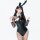Sexy anime cosplay outfit featuring a black leather bunny girl costume with fishnet stockings and bunny ears.