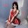 A woman wears a red polka dot babydoll nightgown with scalloped trim and halter neck, paired with a matching headband and bow...