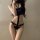 Guiyun sensual lingerie set featuring a pure and tempting lace low-rise g-string with halter neck design, highlighting elegan...