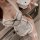 Woman in white hanno jk sexy lingerie nurse outfit with black trim, holding hello kitty item, showcasing sweet temptation pur...