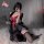A woman poses in a black floral japanese-style lingerie kimono set, featuring a seductive design with no-remove stockings, em...