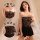 Woman modeling black lace-trimmed tube top dress with sheer bodice and flared mini skirt, highlighting sensual fit and plus-s...