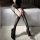 Sexy black fishnet stockings with thigh-highs, lace-up design, sheer fabric, bold and edgy look.