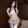 Japanese-style school uniform featuring a revealing top with a bow tie and a pleated skirt, perfect for women seeking a cute ...