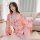 A woman wears a japanese cherry blossom lace corset robe set, featuring sheer kimono-inspired design with vibrant floral patt...
